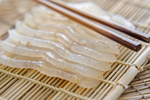 誘人牙簽魚片美食攝影圖，廣告素材下載